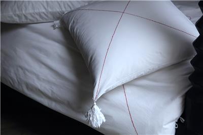 Valerie Barkowski bed linen blanc KROSS carmin detail credit tania panova